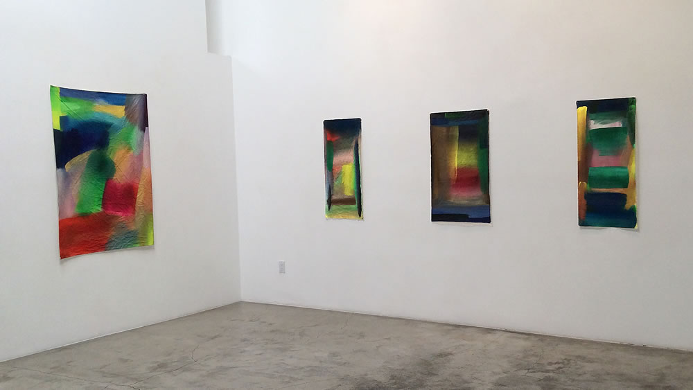 installation views of FIG show, showing  Patchwork, Blue Fog, Twilight Yellow and Green Horizon